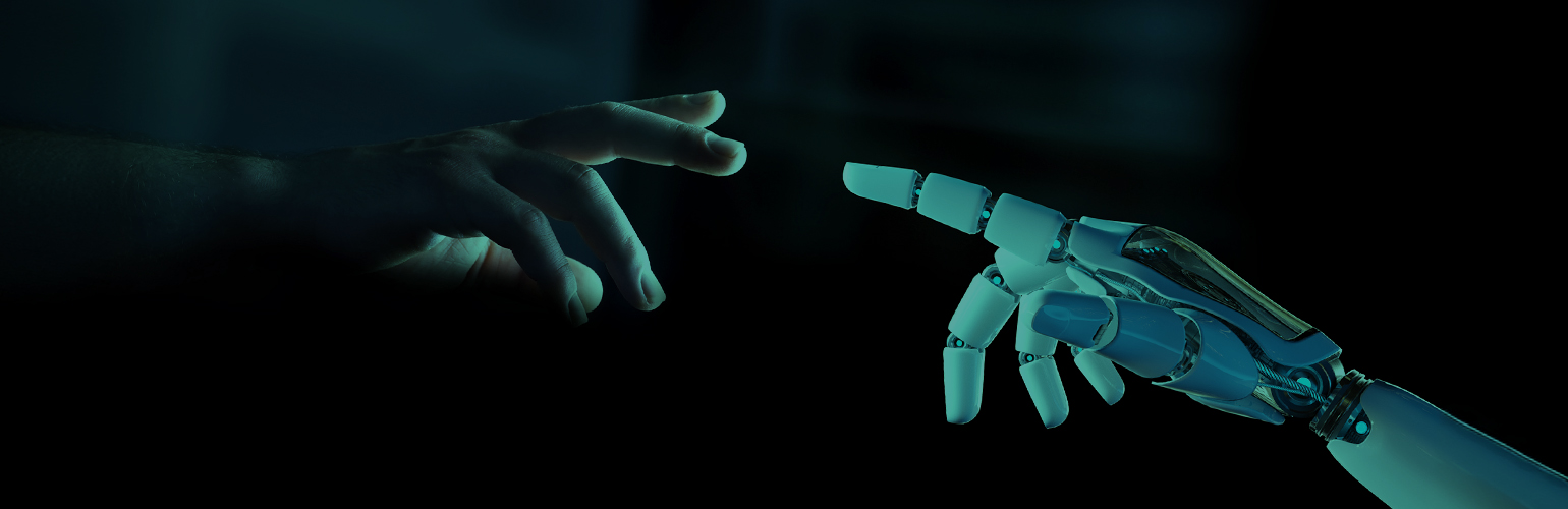 Eine menschliche Hand berührt eine Roboterhand